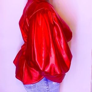 Silk top with puffy sleeve and small chest slit